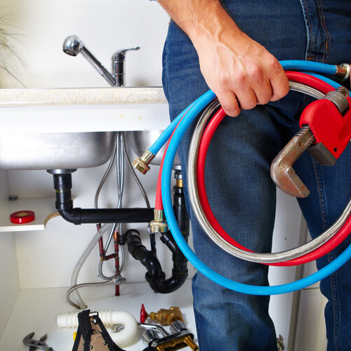 plumber with various tools